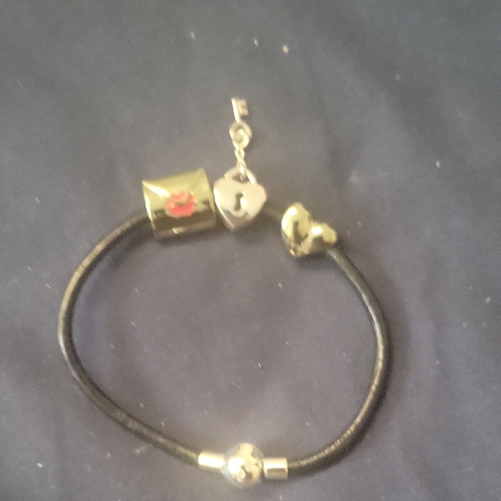 Elegant Silver and Gold Charm Bracelet